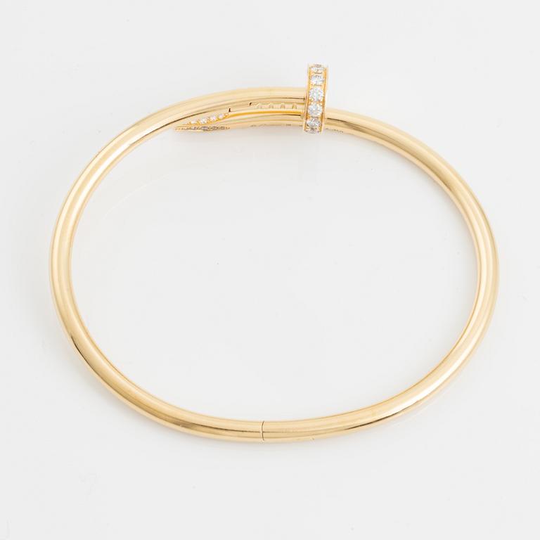 Cartier "Juste un Clou" 18K guld med runda briljantslipade diamanter.