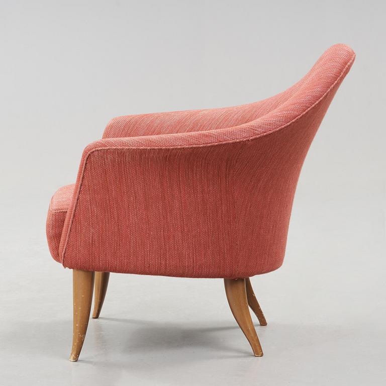 A chair "Lilla Adam" by Kerstin Hörlin-Holmquist.