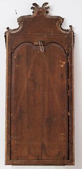 A Northern-European late baroque giltwood mirror, first part of the 18th century.