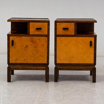 A pair of 1930s bedside tables.