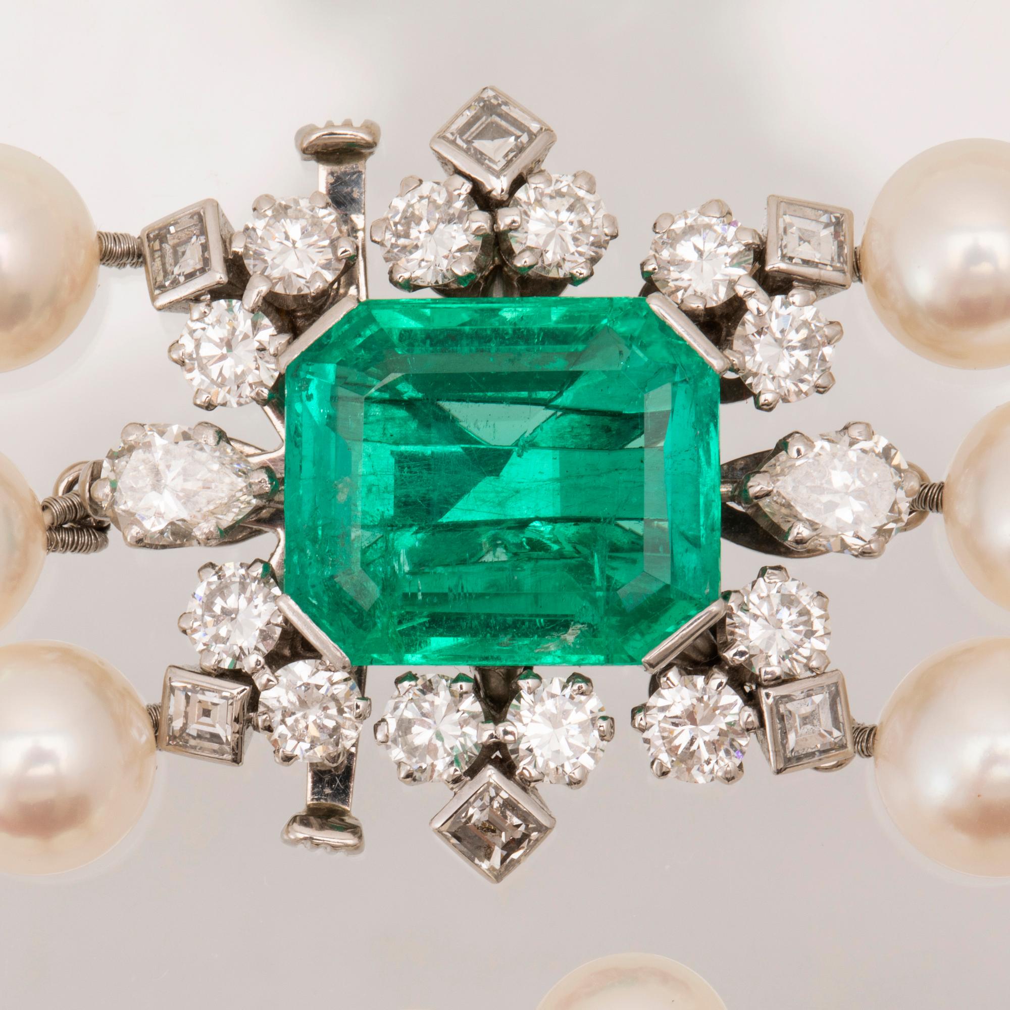 W.A. Bolin, a cultured pearl necklace with an 18K white gold clasp set with an emerald and diamonds, Stockholm 1960.
