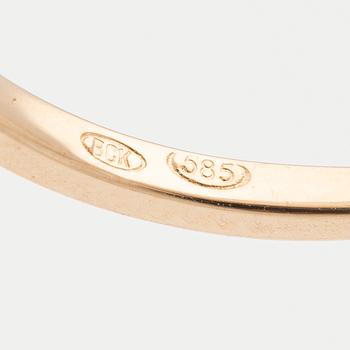 Ring 14K rose gold with orange sapphire and brilliant-cut diamonds.