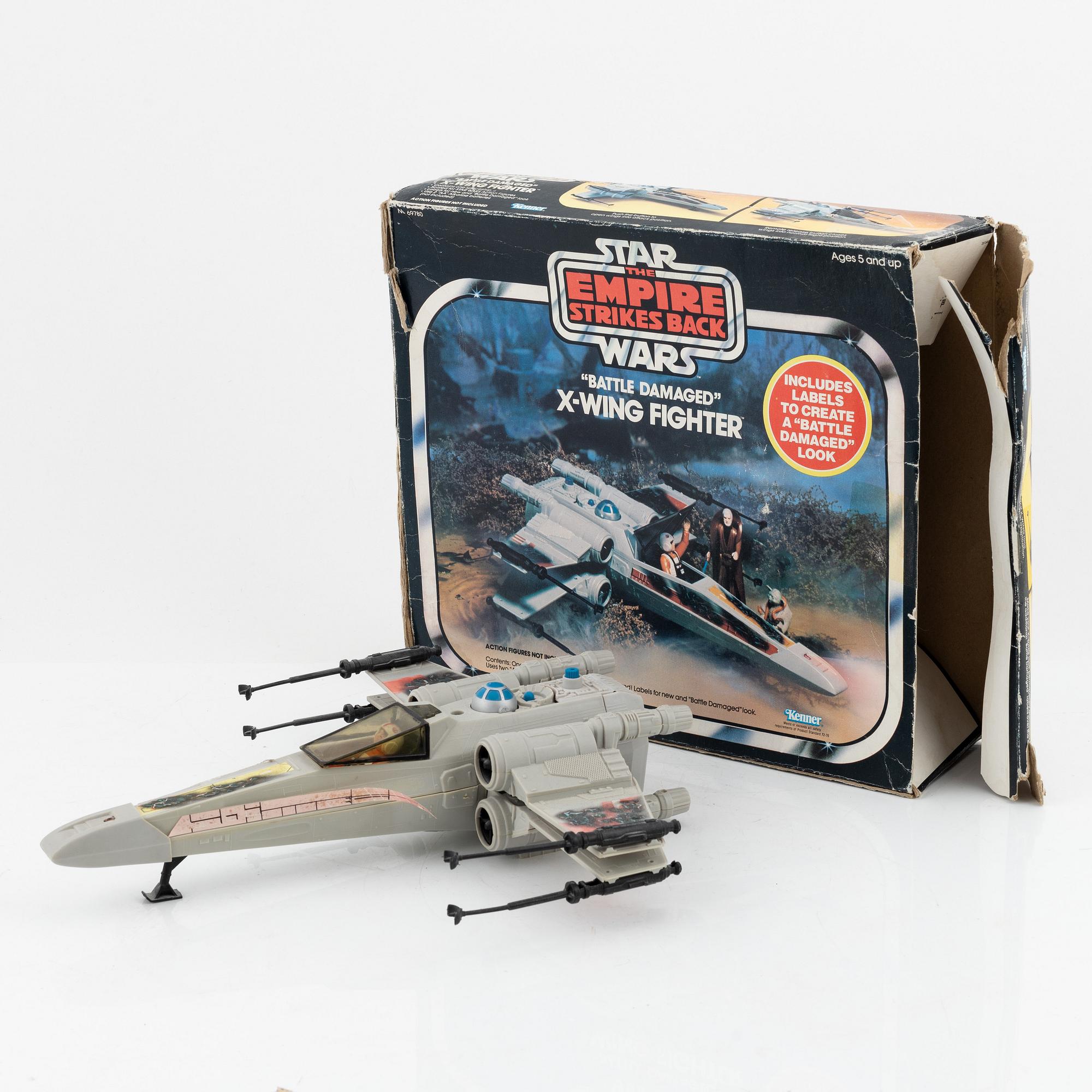 Star Wars, a set of 23 action figures and vehicles, 1970's/80's.