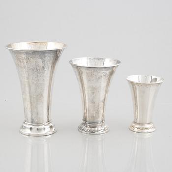 A set of three Swedish silver beakers, including CG Hallberg, Stockholm 1951.