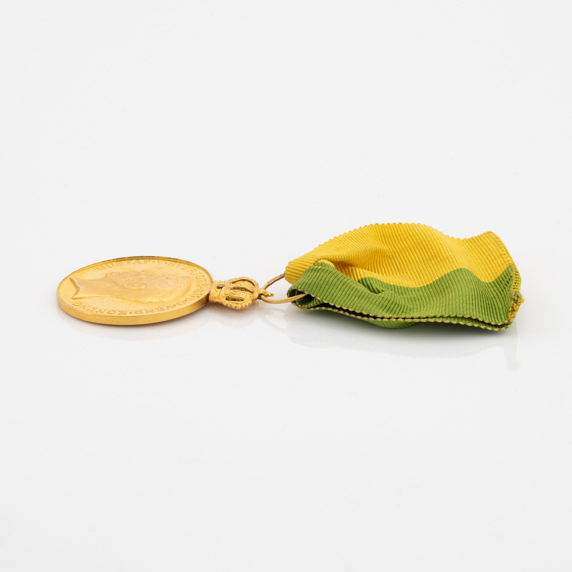 A Swedish 18 ct gold medal.