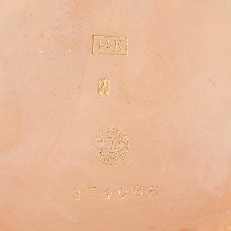 HERRFICKUR OCH KLOCKSTÄLL, 14k guld, boett märkt IWC, International Watch Company, Schaffhausen, 1900-talets första hälf.