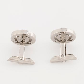 OMEGA, ett par manschettknappar.