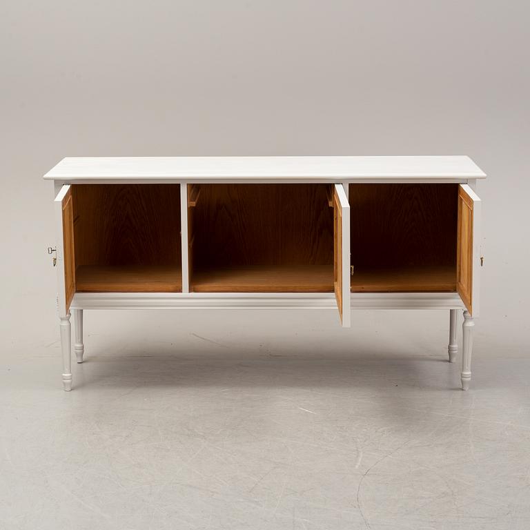 A painted Gustavian style sideboard, second half of the 20th Century.