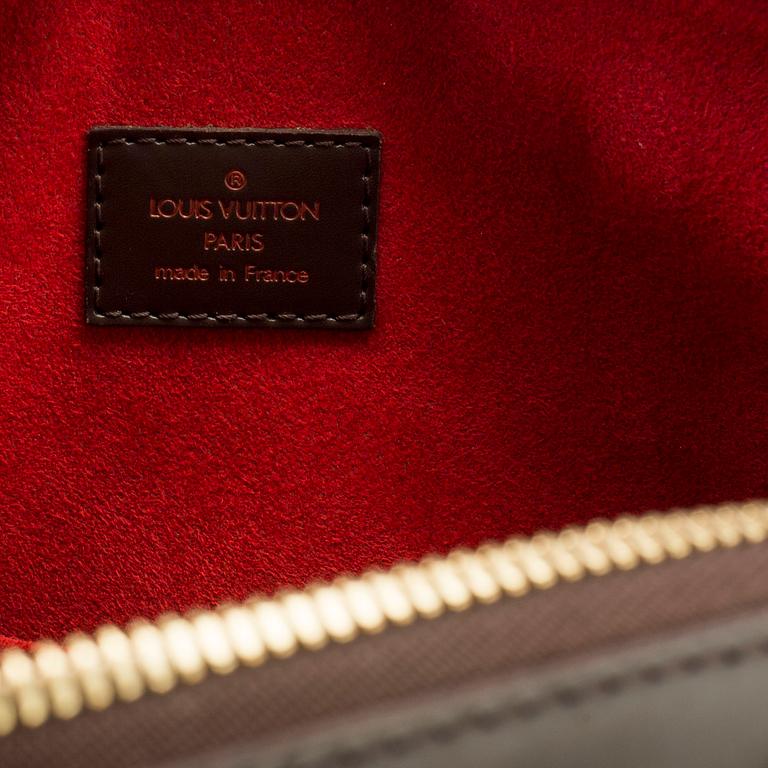 a LOUIS VUITTON 'Trevi GM' bag.