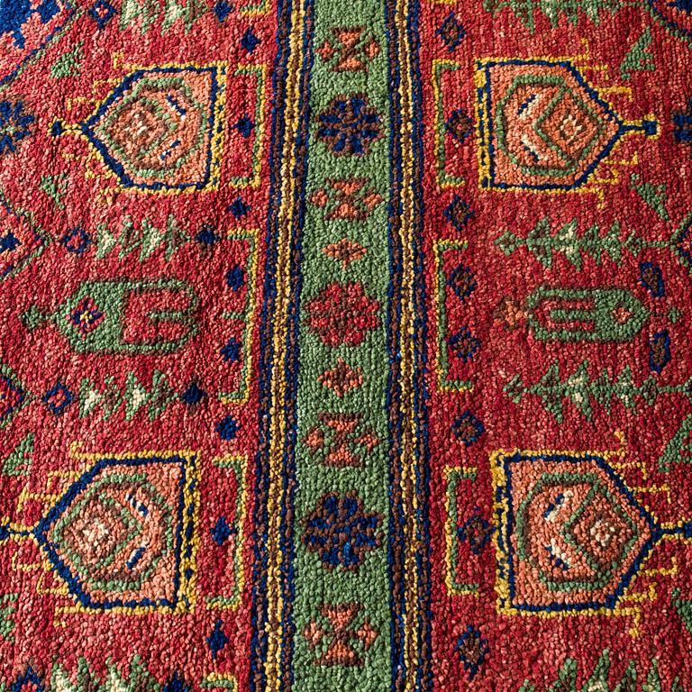 A carpet, Hereke Design, ca 305 x 242 cm.