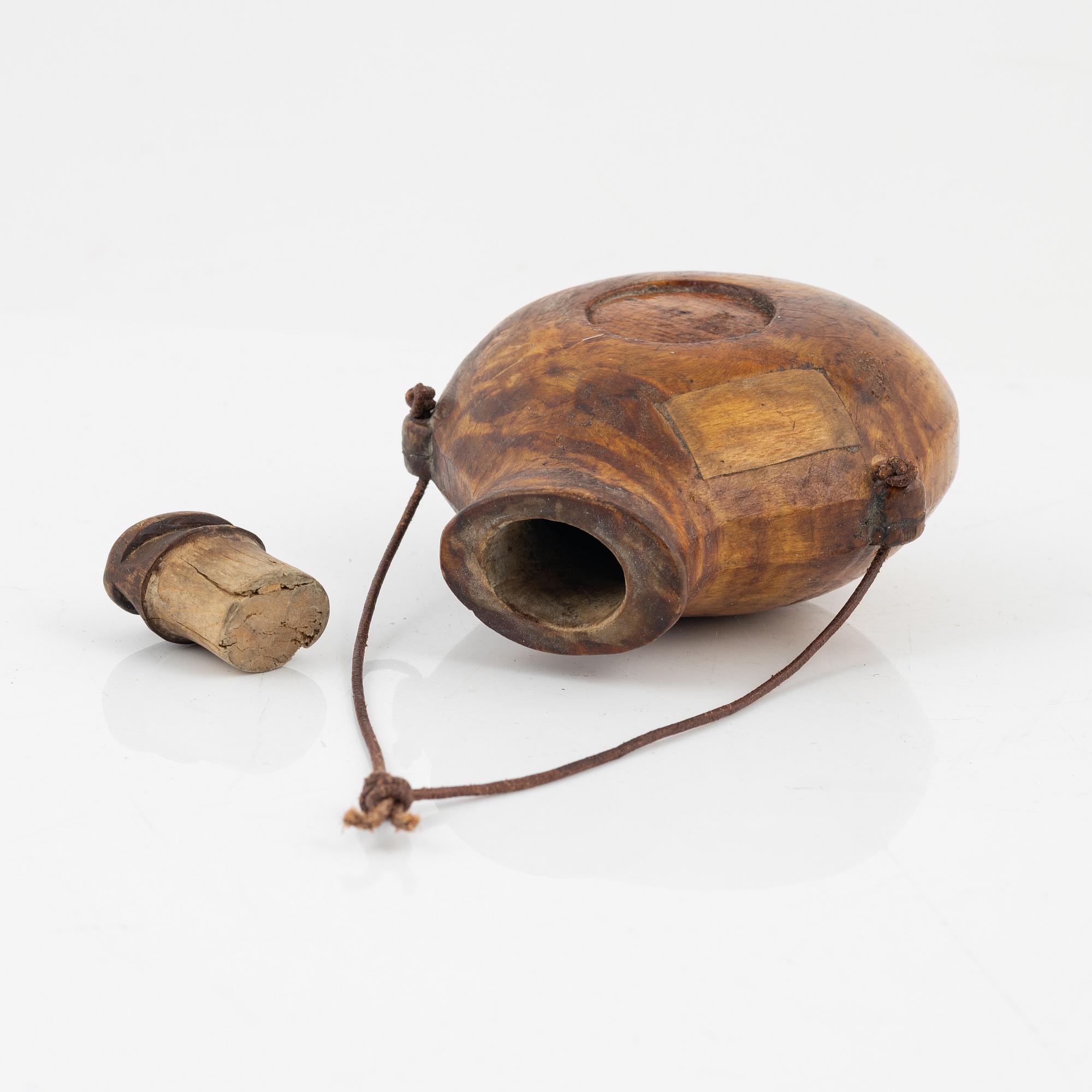 A birch salt bottle, dated 1925.