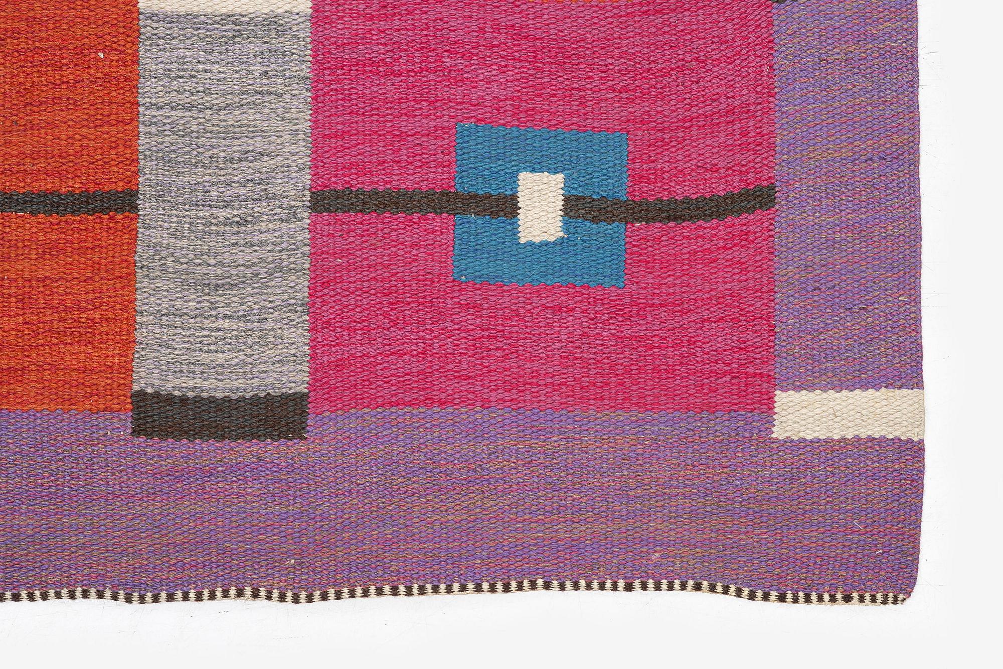 Agda Österberg, a flat weave and tapestry weave carpet, c. 330 x 123 cm, signed AÖ.
