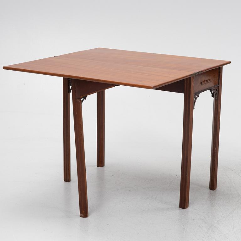 A macthed pair of late Gustavian mahogany veneered card tables one by C D Fick, Stockholm 1776-1806.