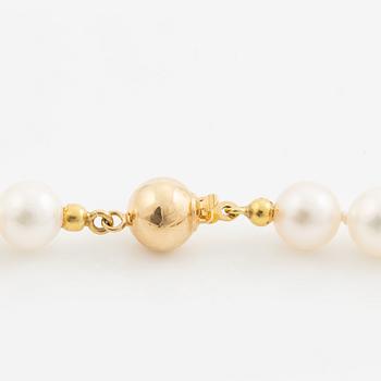 Collier odlade pärlor lås 18K guld.