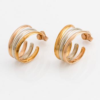 501. A pair of 18K gold Cartier earrings.