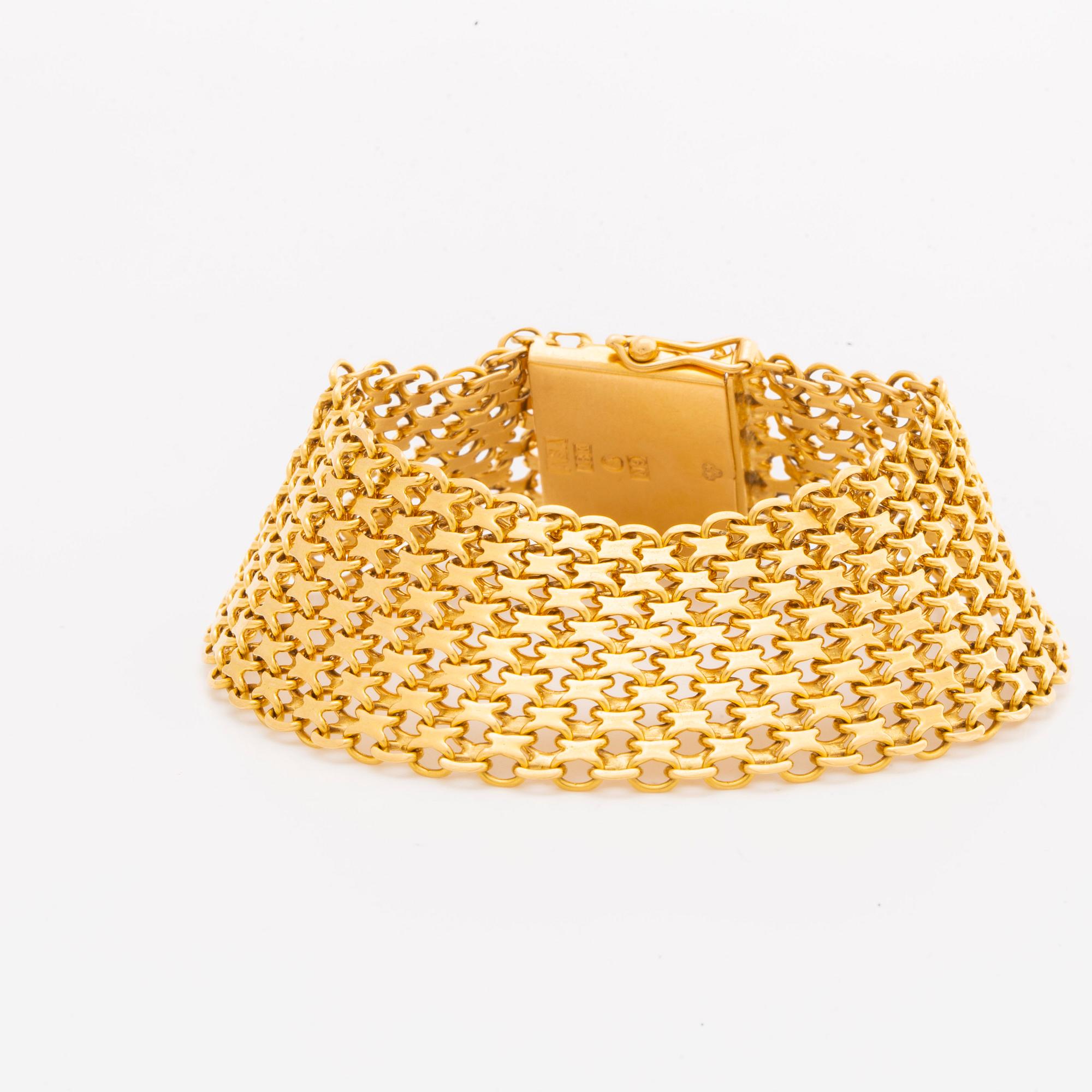 ARMBAND 18K guld bred x-länk, 48,5 g, Ädelsmycken AB Stockholm 1963.