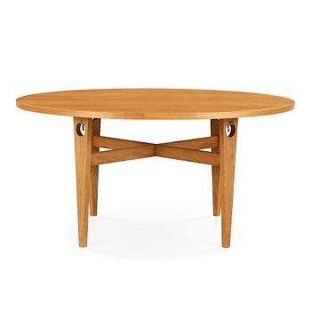 63. Hans J. Wegner, an oak dining table, Getama, Denmark.