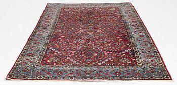 A carpet, Kerman, c. 224 x 127 cm.