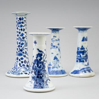 Four chinese 19th century blue and white porcelain candle holders. Qing dynasty.