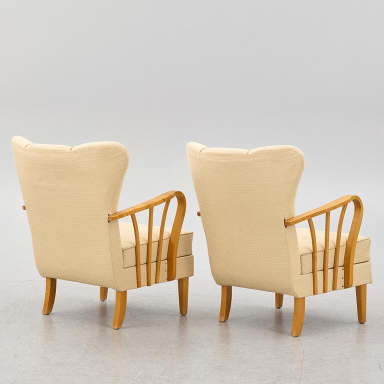 A pair of 1940s Swedish Modern armchairs.