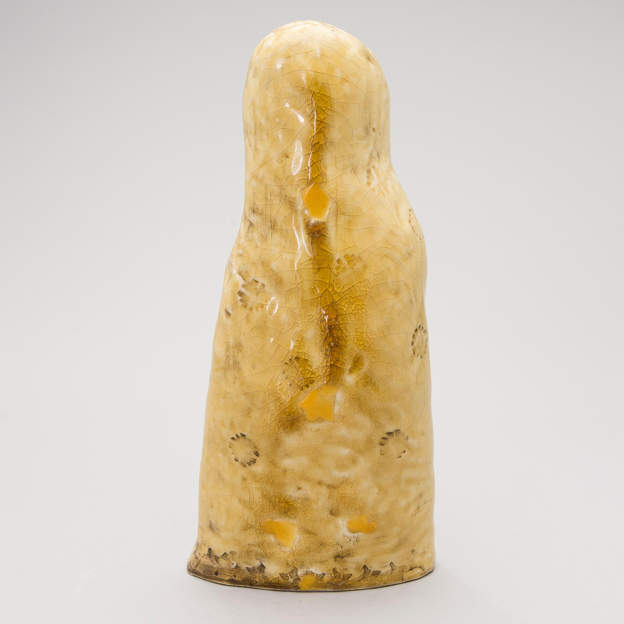 A stoneware figurine signed BRYK.