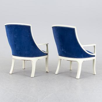 A pair of art nouveau armchairs.