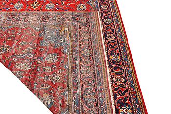 A Hamadan carpet, a. 320 x 220 cm.
