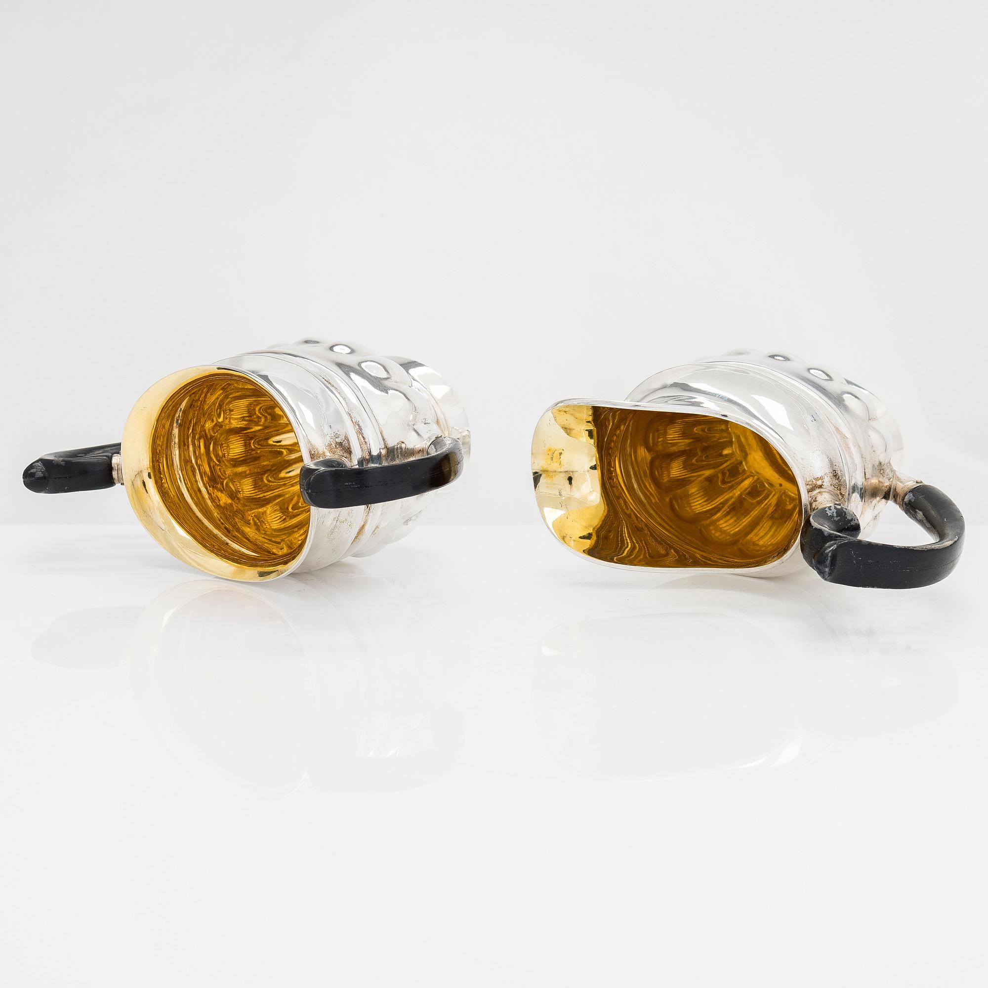 Sugar bowl and cream jug, and four pieces of silver cutlery, Vyborg, Turku, Hämeenlinna and Helsinki 1926-60.