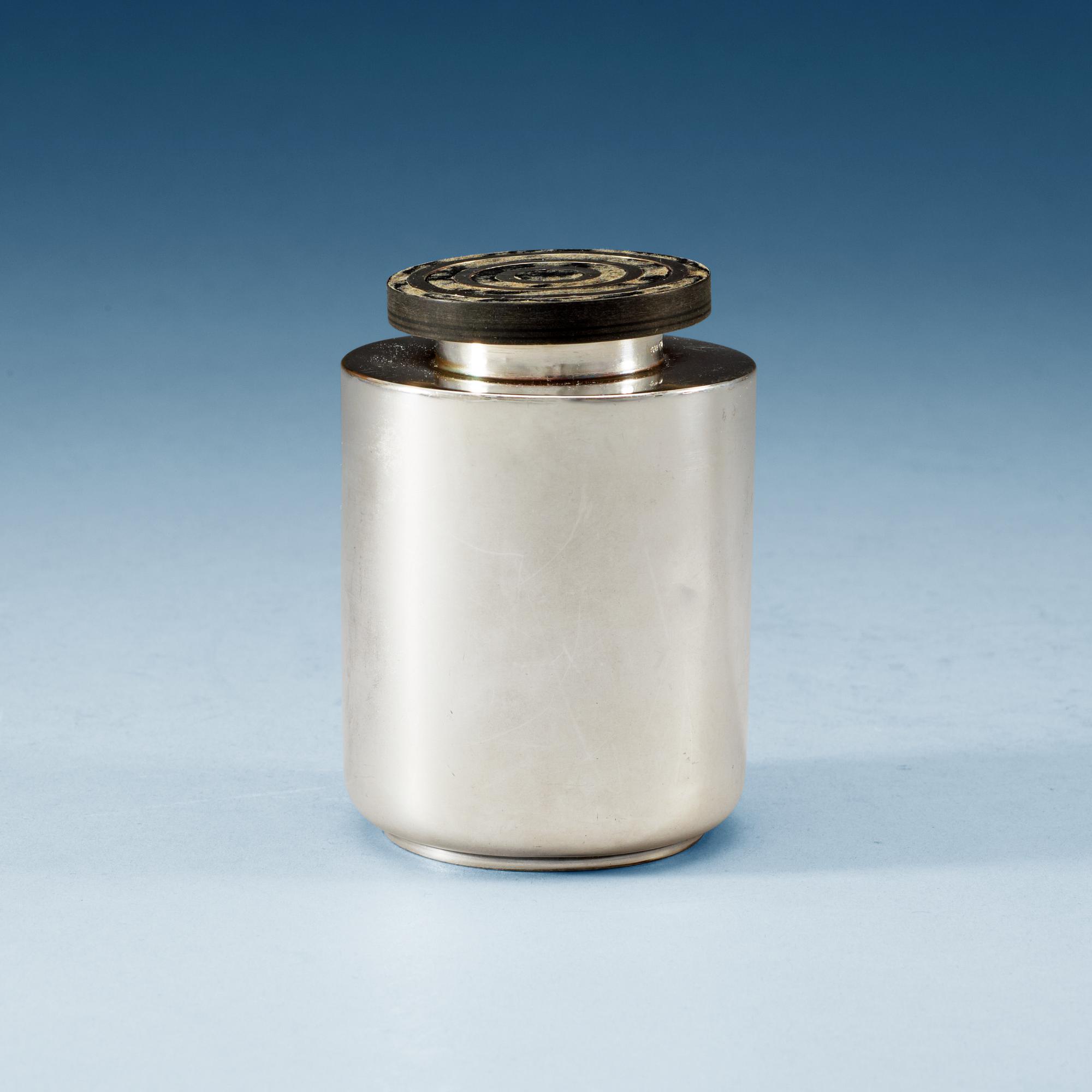 A silver and ebony tea-caddy, probably designed by Eric Pihlgren for Guldsmedsaktiebolaget, Stockholm 1934.
