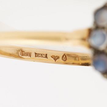 A moonstone and marcasite bangle and pair of earrings.