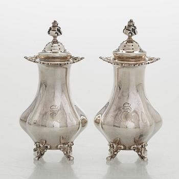 Black Starr & Frost, a pair of sterling silver shakers and sugar bowls, USA around 1900, Gorham pair of sterling spoons.