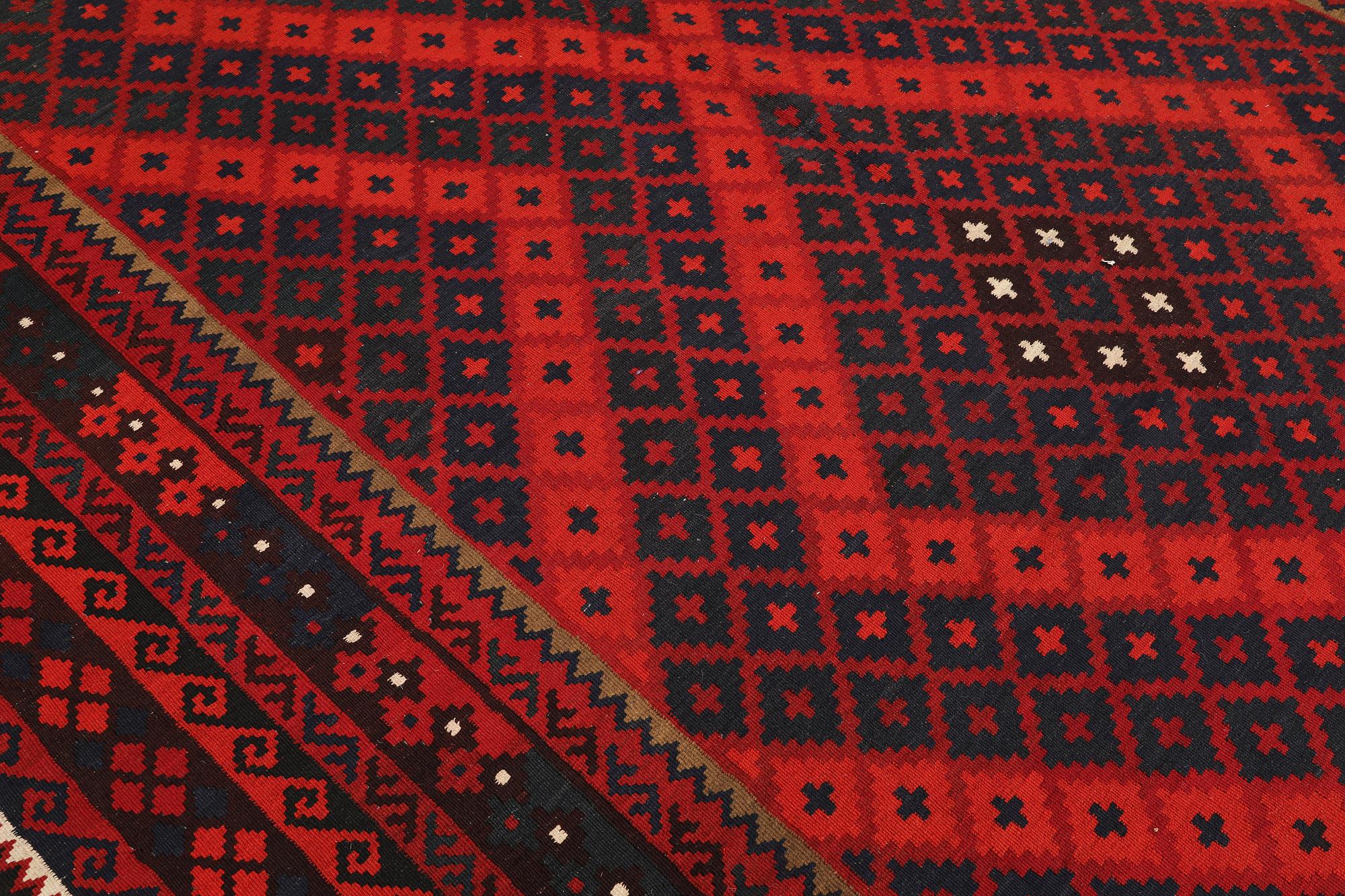 A Afghan kelim carpet, 361 x 241 cm.