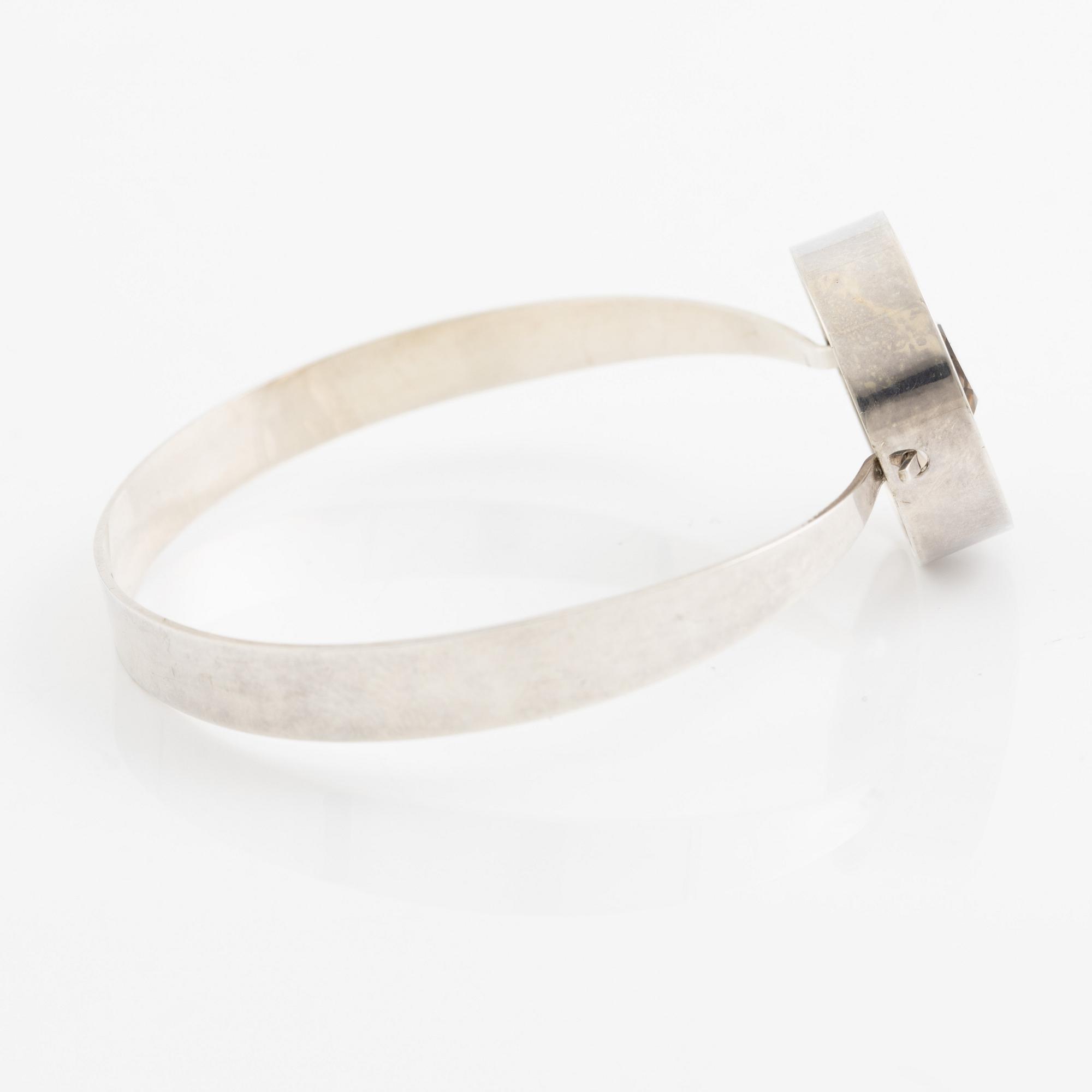 Arm ring and brooch, silver with smoky quartz, Kultasepät Salovaara.