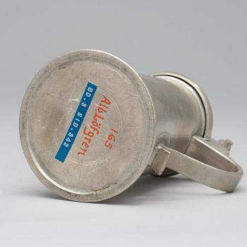 A pewter jug by J Ch Pohlitz 1727.