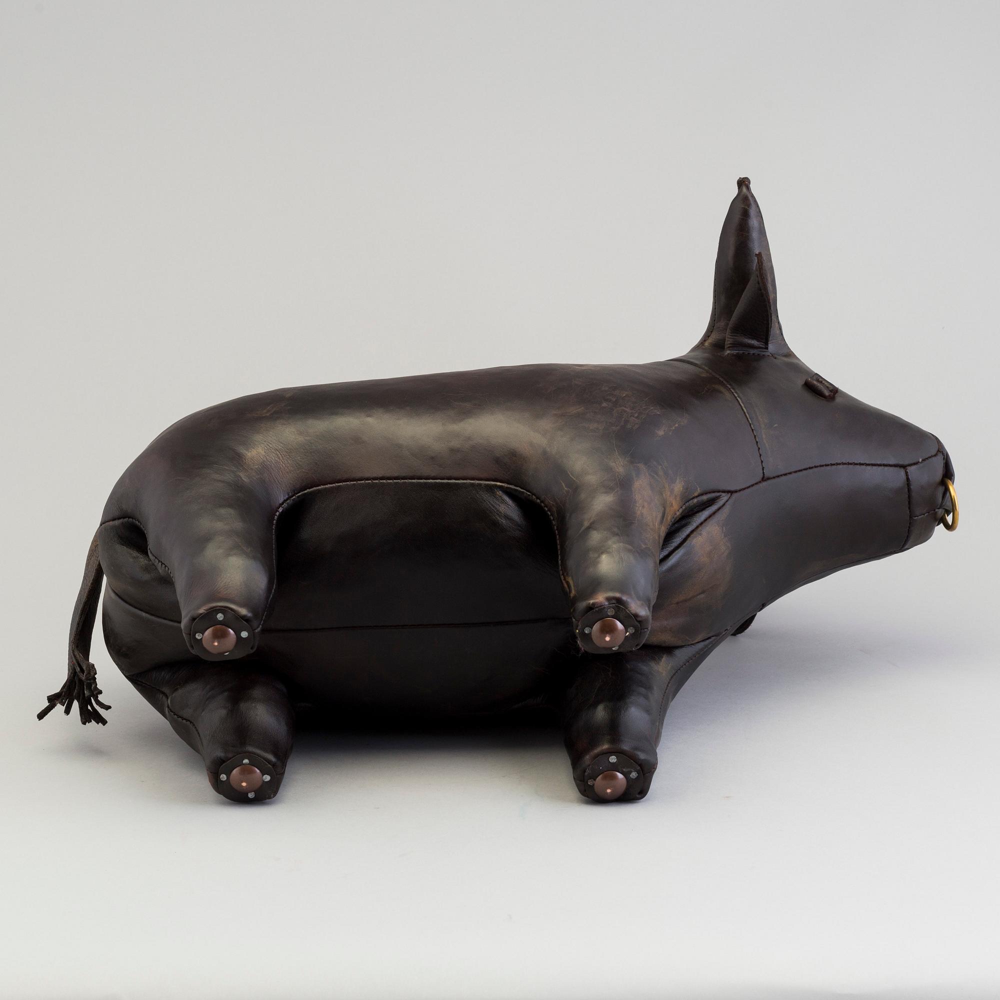DIMITRI OMERSA & CO, a leather stool in the shape of a bull.