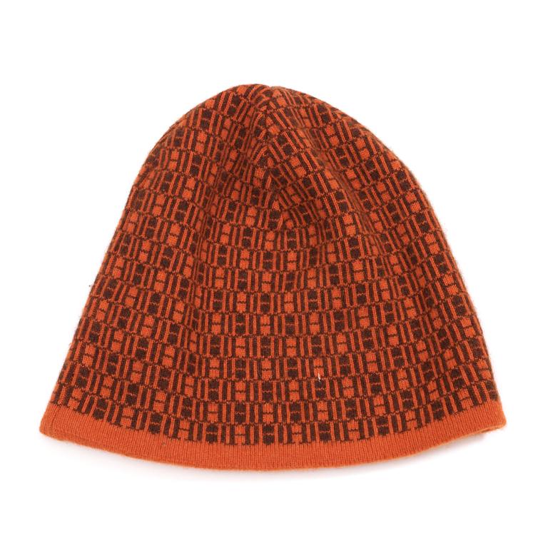 A 2000s orange/brown hat by Hermès.