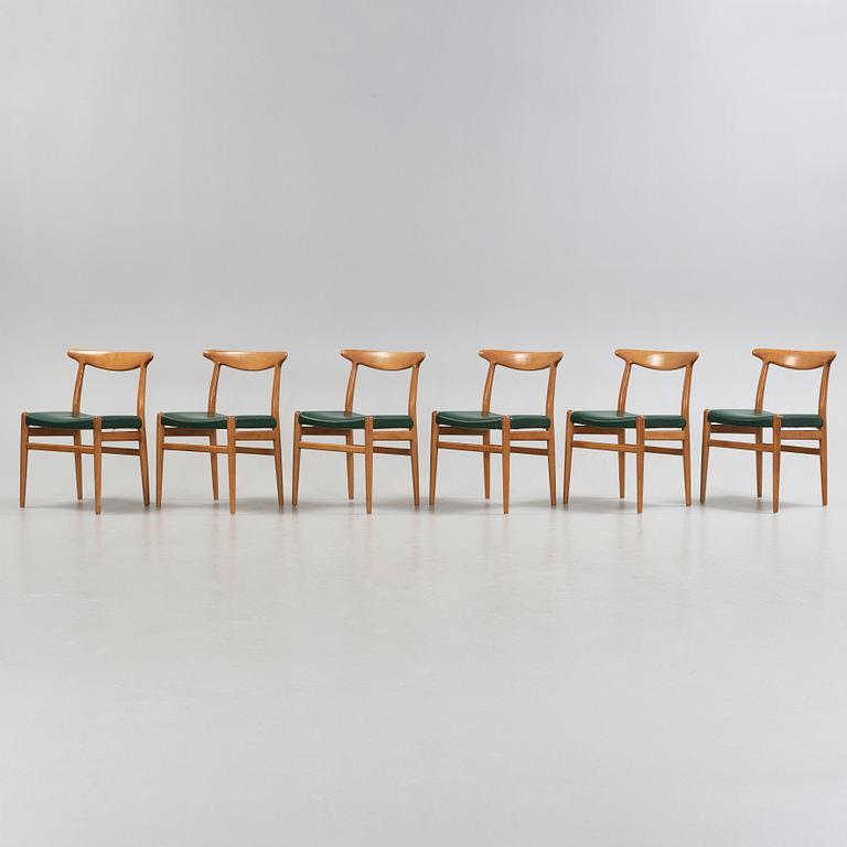 Hans J. Wegner, a set of six oak chairs, CM Madsen Fabriker, Denmark.