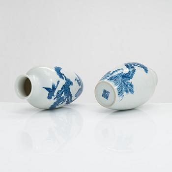 A pair of Chinese blue and white porcelain vases, 20th-century.