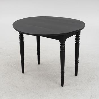 A drop-leaf table, late 19th century.