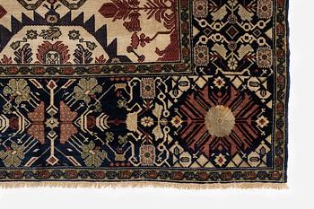 An antique Malajir rug, c. 179,5 x 124 cm (as well as one end with 2.5 cm flat weave).