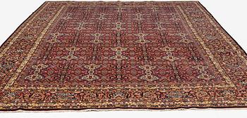 A semi-antique Semnan carpet, North Persia, c. 412 x 304 cm.
