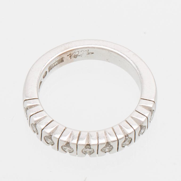 Half-eternity ring in 18K white gold with round brilliant-cut diamonds, Art Metall Helsingborg.