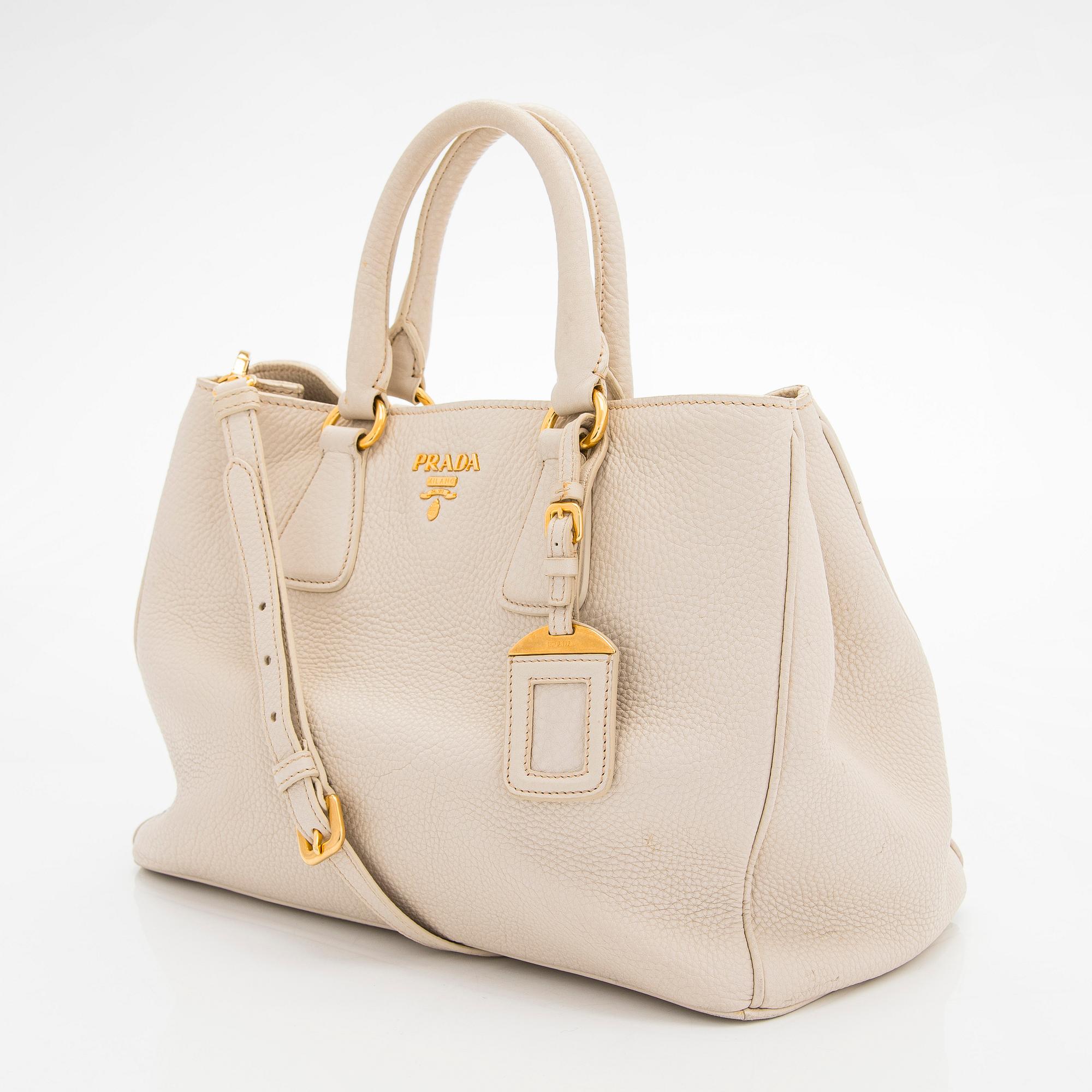 Prada, a 'Vitello Daino Tote' bag.