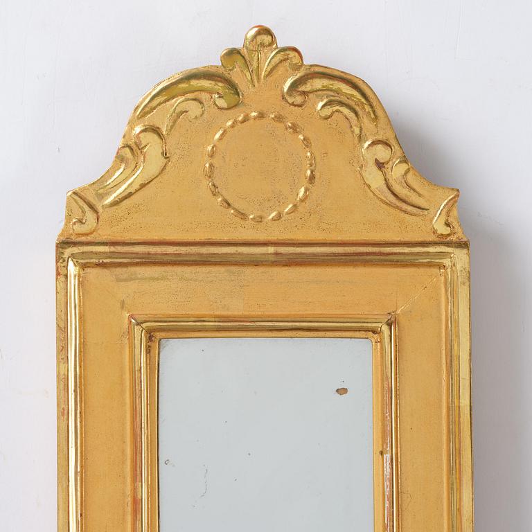 A pair of Gustavian giltwood one-light girandoles by J. P. Helin (master in Stockholm 1763-94).