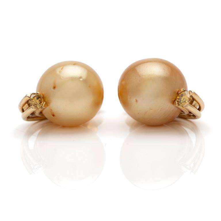 18K gold earrings with South Sea pearls and diamonds.