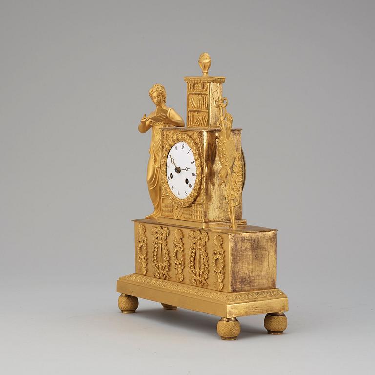 A French Empire early 19th century gilt bronze mantel clock.