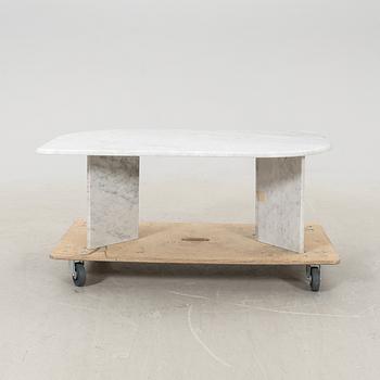 A 21st century marble coffee table.