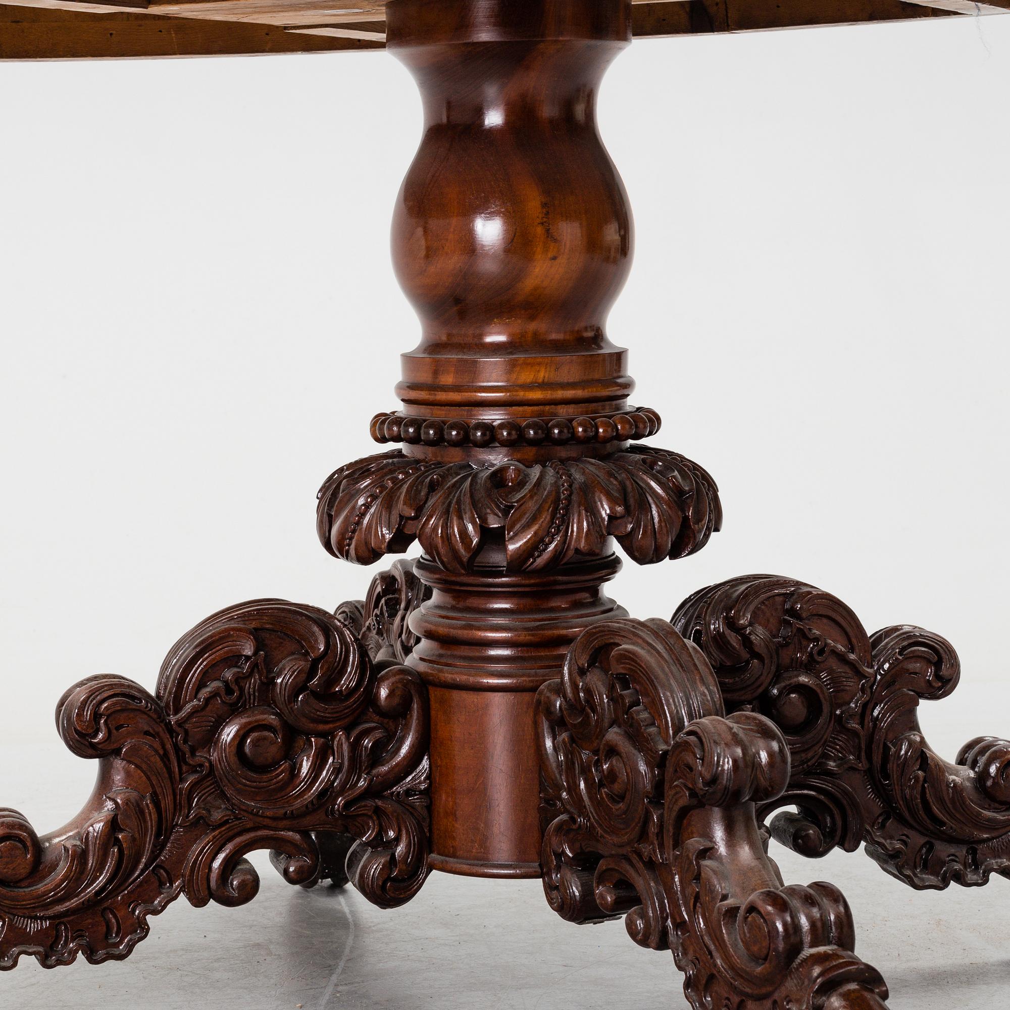 A mid 19th century mahogny table.