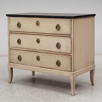 An early 20th century painted chest of drawers.