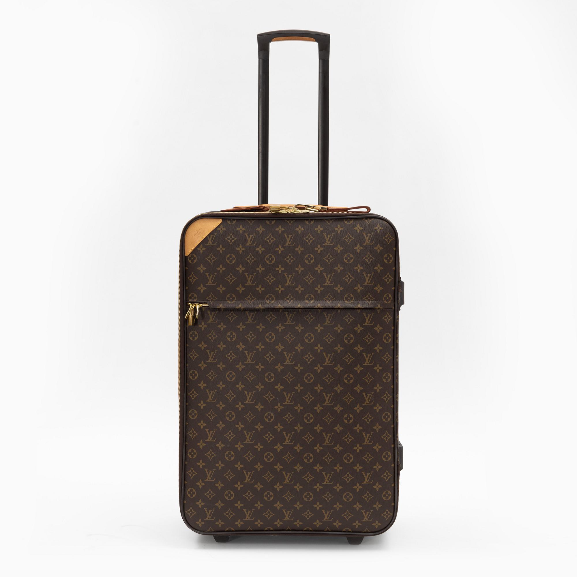 Louis Vuitton, a monogram canvas 'Pégase 65' suitcase.